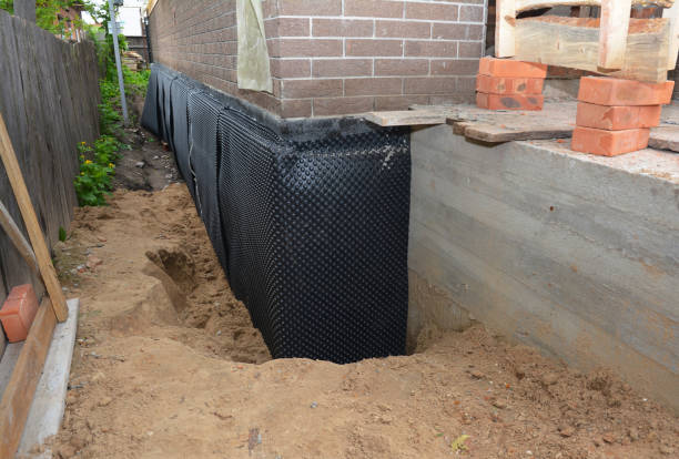 SJ Waterproofing Pros technician performing targeted Exterior Waterproofing assessment in Hermitage, TN